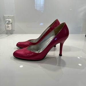 Stuart Weitzman patent pink pumps